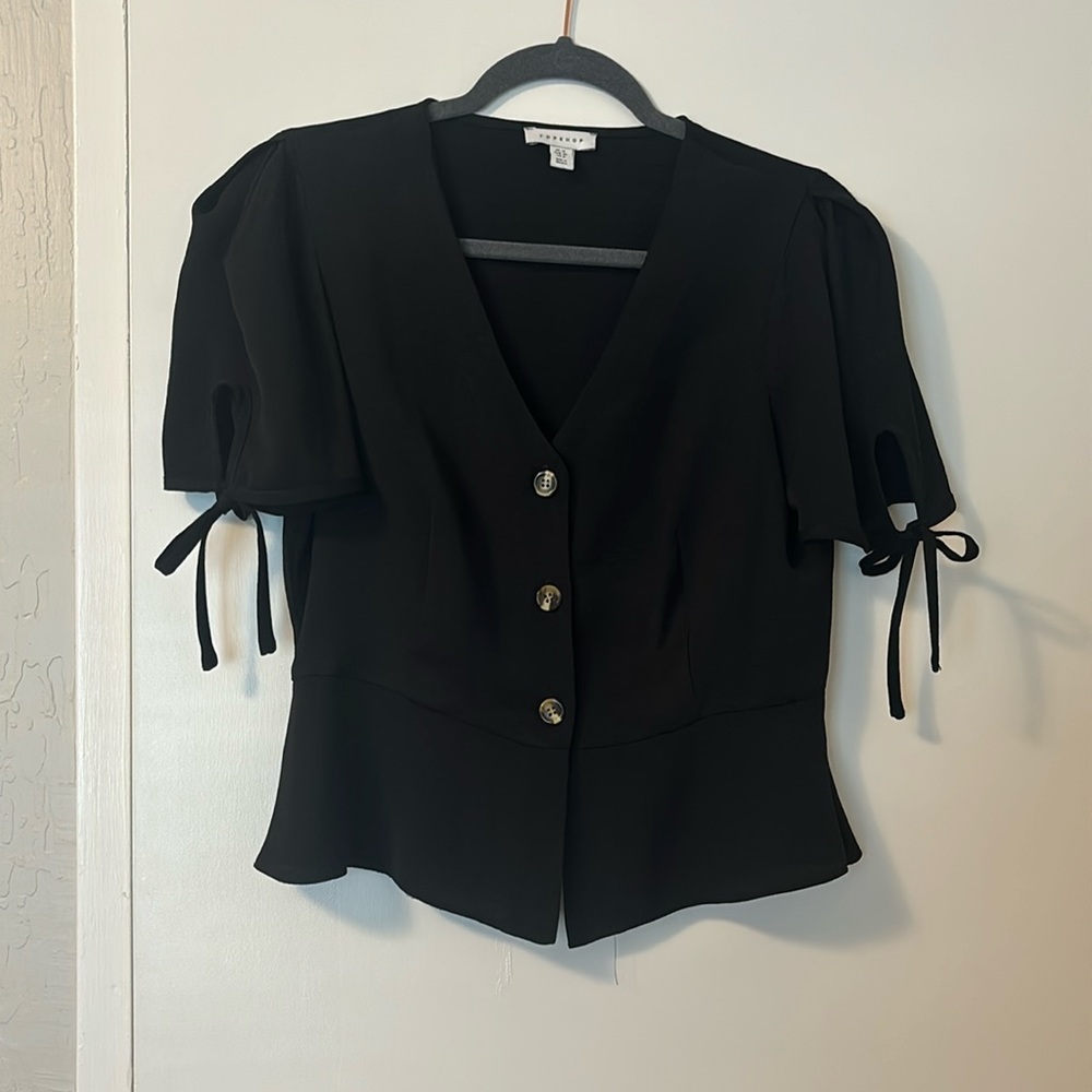 Topshop black button up puff sleeve top.